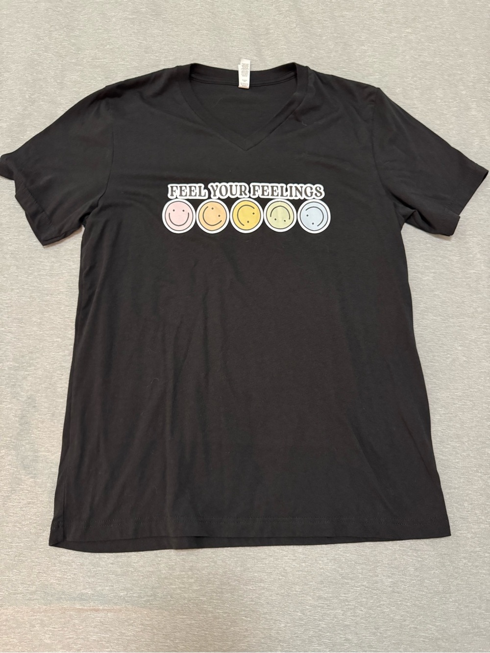 Bella Canvas Black Short Sleeve Tee with Pastel Feel Your Feelings Graphic